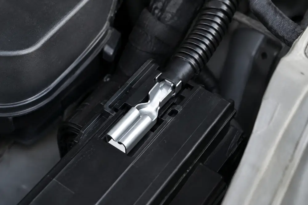 ZUCH automotive connector seated in a road-vehicle engine-bay electronics compartment